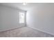 Neutral bedroom with carpet, window, and natural light at 2797 Malton Way, Loganville, GA 30052