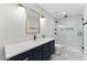 Modern bathroom features a glass-enclosed shower, stylish vanity, and elegant fixtures at 3990 Old Spring House Ct, Atlanta, GA 30338