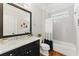 Bathroom featuring marble countertops, a soaking tub, and modern fixtures for a spa-like experience at 3990 Old Spring House Ct, Atlanta, GA 30338