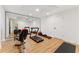Home gym with mirrored wall, featuring essential workout equipment and plenty of space at 3990 Old Spring House Ct, Atlanta, GA 30338