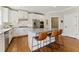 Contemporary kitchen with white cabinets, granite countertops, stainless steel appliances, and a central island at 3990 Old Spring House Ct, Atlanta, GA 30338