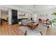 Bright living area featuring stylish bar, cozy seating, and plenty of room to relax at 3990 Old Spring House Ct, Atlanta, GA 30338