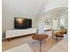 Sitting room featuring neutral decor, modern lighting, and cozy furniture perfect for relaxation at 3990 Old Spring House Ct, Atlanta, GA 30338