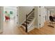 Finished basement stairs leading to an exercise and dining area at 3990 Old Spring House Ct, Atlanta, GA 30338