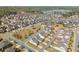 Aerial view showcasing a neighborhood with neatly arranged homes and a central community green at 4425 Atwood Dr, Cumming, GA 30040