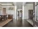 Grand entrance hall with rich hardwood floors, decorative accents, and traditional trim work, inviting elegance and style at 4425 Atwood Dr, Cumming, GA 30040
