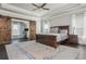 Main bedroom with tray ceilings, barn door, and a spacious layout at 4425 Atwood Dr, Cumming, GA 30040