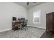Home office with a desk, computer, and large window at 4425 Atwood Dr, Cumming, GA 30040