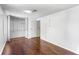 This bedroom has hardwood floors and closet space at 8827 Applegate Ln, Atlanta, GA 30350