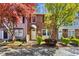 Charming brick townhouse with mature trees and well-manicured landscaping offers great curb appeal at 8827 Applegate Ln, Atlanta, GA 30350