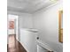 Bright hallway with hardwood floors leading to another room at 8827 Applegate Ln, Atlanta, GA 30350