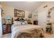 Comfortable bedroom with nautical themed décor, providing a peaceful retreat at 1152 Simonton Glen Way, Lawrenceville, GA 30045