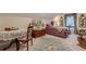 Cozy bedroom with sloped ceiling, decorative accents, and ornate furnishings creating a unique and charming space at 1152 Simonton Glen Way, Lawrenceville, GA 30045