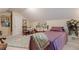 Comfortable bedroom features sloped ceiling, a cozy bed, and a decorative rug adding a touch of warmth at 1152 Simonton Glen Way, Lawrenceville, GA 30045