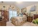 Comfortable bedroom with nautical themed décor, providing a peaceful retreat at 1152 Simonton Glen Way, Lawrenceville, GA 30045