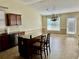 Bright dining area offering simple, modern fixtures and a seamless transition to the kitchen at 1152 Simonton Glen Way, Lawrenceville, GA 30045