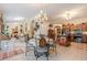 Spacious dining area with smooth flooring that connects kitchen to the bedroom and living spaces at 1152 Simonton Glen Way, Lawrenceville, GA 30045