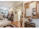 Spacious foyer with hardwood floors and views into the living room, blending classic design at 1152 Simonton Glen Way, Lawrenceville, GA 30045