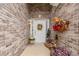 Inviting front porch with seasonal decorations and brick accents, creating a warm welcome at 1152 Simonton Glen Way, Lawrenceville, GA 30045