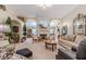 Cozy living room featuring a fireplace, arched doorways, and elegant décor at 1152 Simonton Glen Way, Lawrenceville, GA 30045