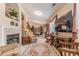 Spacious living area with fireplace, neutral tones, and seamless transition to other rooms at 1152 Simonton Glen Way, Lawrenceville, GA 30045