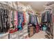 Spacious walk-in closet featuring ample room for storage and organization at 1152 Simonton Glen Way, Lawrenceville, GA 30045