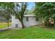 View of the backyard and exterior with mature trees at 1441 Ezra Church Nw Dr, Atlanta, GA 30314