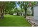 Spacious backyard with lush green grass and mature trees at 1441 Ezra Church Nw Dr, Atlanta, GA 30314