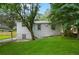 View of the backyard and exterior with mature trees at 1441 Ezra Church Nw Dr, Atlanta, GA 30314
