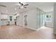 Open-concept living area with modern kitchen featuring stainless appliances and updated cabinetry at 1441 Ezra Church Nw Dr, Atlanta, GA 30314