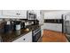 Well-equipped kitchen featuring stainless steel appliances, granite countertops, and plenty of storage space at 1803 Gold Finch Way, Lawrenceville, GA 30043