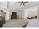 Spacious main bedroom with a large bed, dresser, and seating area at 1803 Gold Finch Way, Lawrenceville, GA 30043