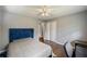 This bedroom features a ceiling fan, wood floors, and closet at 4329 Cedar Valley Ln, Conley, GA 30288