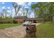 Lovely brick home with a carport, complemented by lush greenery and a neatly maintained driveway at 4329 Cedar Valley Ln, Conley, GA 30288