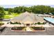 Aerial view featuring tennis courts, a pool, and clubhouse at 7350 S Mitchell Ct, Villa Rica, GA 30180