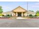 Exterior of community clubhouse with meticulous landscaping and walkways at 7350 S Mitchell Ct, Villa Rica, GA 30180
