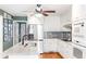 Modern kitchen featuring stainless steel appliances, granite countertops, and white cabinetry at 7350 S Mitchell Ct, Villa Rica, GA 30180