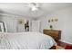 Cozy bedroom offers a walk-in closet, hardwood floors, and natural light at 1131 Hershey Dr, Marietta, GA 30062