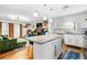 Bright, open kitchen with a breakfast bar, leading to a comfortable living area at 1131 Hershey Dr, Marietta, GA 30062
