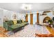Spacious living room with comfortable seating, hardwood floors and bright decor at 1131 Hershey Dr, Marietta, GA 30062