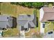 Aerial view of a home with a gray roof surrounded by a large grass lot at 2277 Shady Maple Trl, Loganville, GA 30052