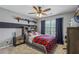 Bedroom featuring neutral paint, carpet flooring and a ceiling fan at 2277 Shady Maple Trl, Loganville, GA 30052
