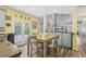 Bright eat-in kitchen with access to the backyard and open to the living spaces, perfect for Gathering gatherings at 2277 Shady Maple Trl, Loganville, GA 30052