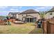 Expansive backyard with large patio, playset and screened-in porch at 2620 Paddock Point Pl, Dacula, GA 30019