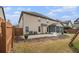 Wide backyard view featuring a patio, play set and wood fencing at 2620 Paddock Point Pl, Dacula, GA 30019