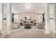 Elegantly staged living room featuring neutral decor, well-placed lighting, and a balanced layout, perfect for relaxation at 2620 Paddock Point Pl, Dacula, GA 30019
