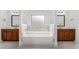 Beautiful bathroom featuring a large soaking tub and separate vanities at 2620 Paddock Point Pl, Dacula, GA 30019