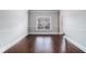 Room with hardwood floors, window, white trim and light grey walls at 2620 Paddock Point Pl, Dacula, GA 30019