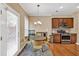 Kitchen dining area featuring stainless steel appliances and access to an outdoor patio at 4125 Madison Bridge Dr, Suwanee, GA 30024