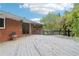 Spacious backyard deck with weathered wood is adjacent to the brick home at 454 Jo Ann Se Dr, Marietta, GA 30067